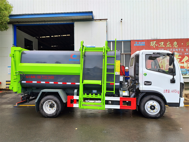 國(guó)六7方 藍(lán)牌東風(fēng)D6 側(cè)裝壓縮垃圾車(chē)